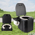 Toilettes pliables ultra-compactes dépliées, couvercle ouvert