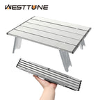 Table pliante WESTTUNE en aluminium montée en extérieur